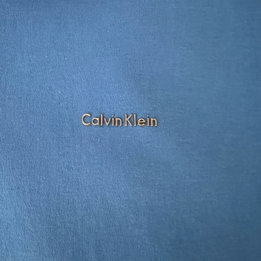 Calvin Klein liquid cotton polo shirt.  Hardly used.  Great shirt.
